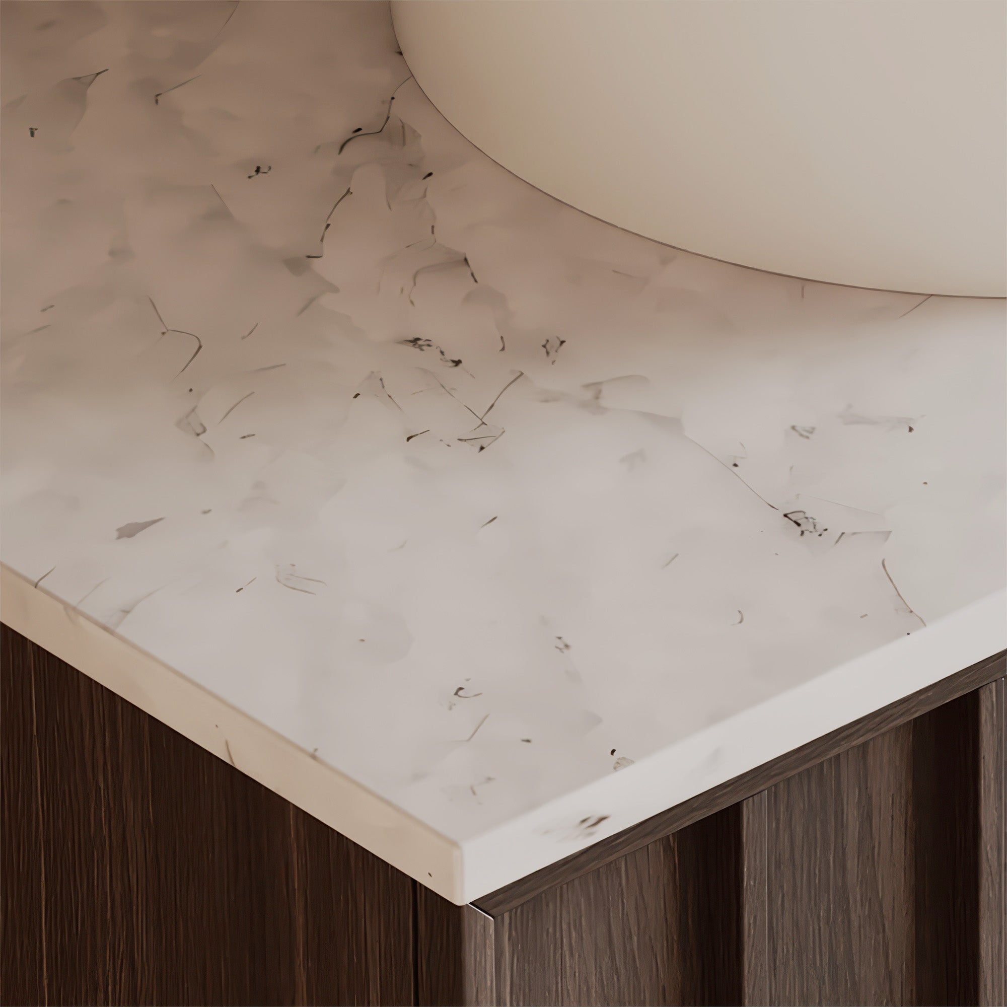 Close-up of a marble countertop with a wooden base
